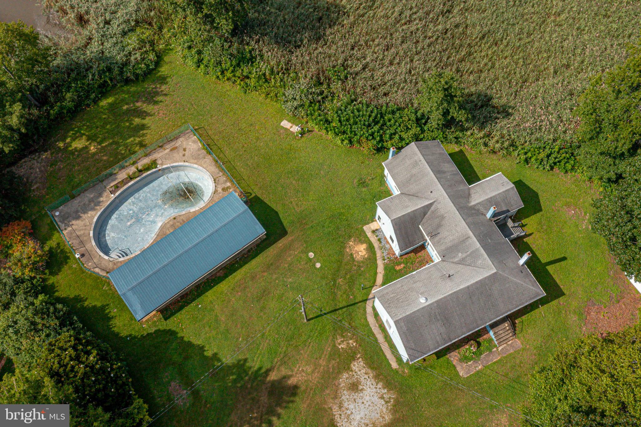69 Buckhorn Road Salem, NJ 08079 - Photo 2 of 38 an aerial view of a house with a garden