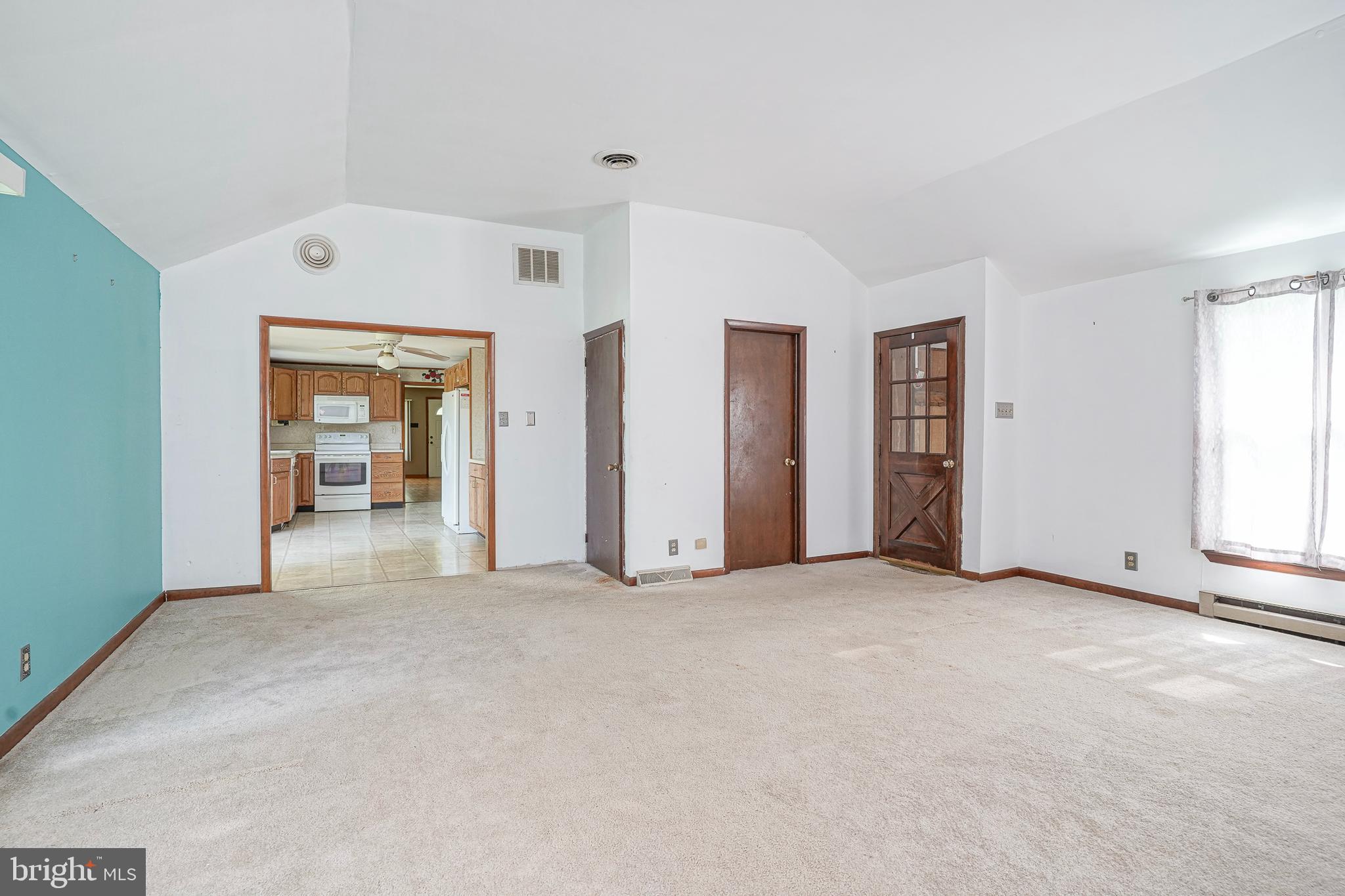 69 Buckhorn Road Salem, NJ 08079 - Photo 21 of 38 an empty room with closet and a large window