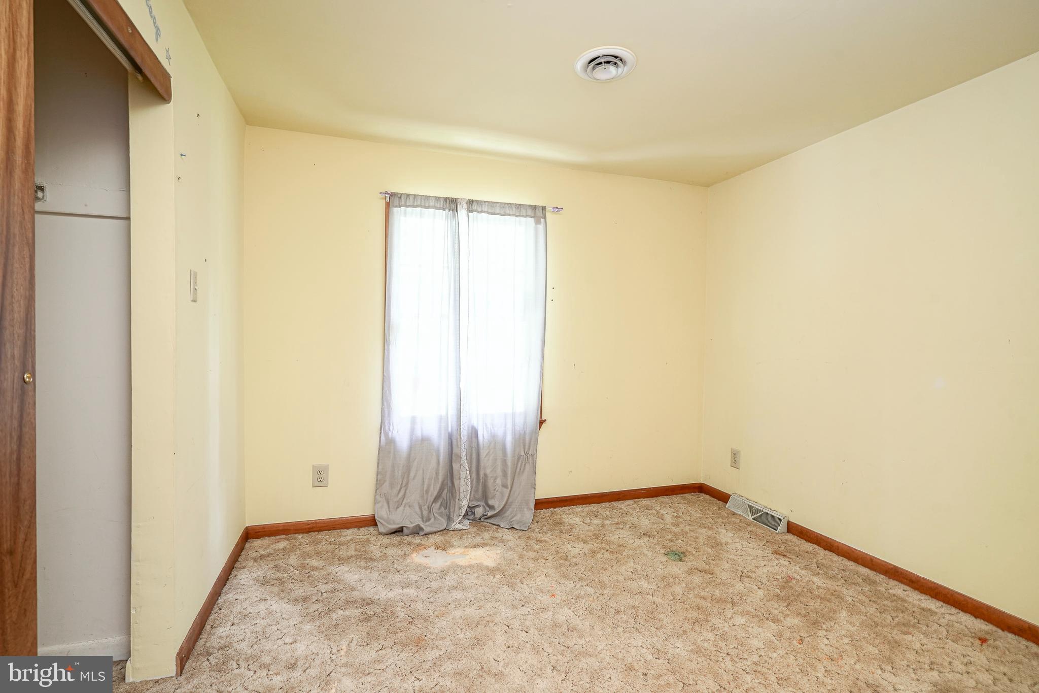 69 Buckhorn Road Salem, NJ 08079 - Photo 28 of 38 an empty room with a empty space and a window