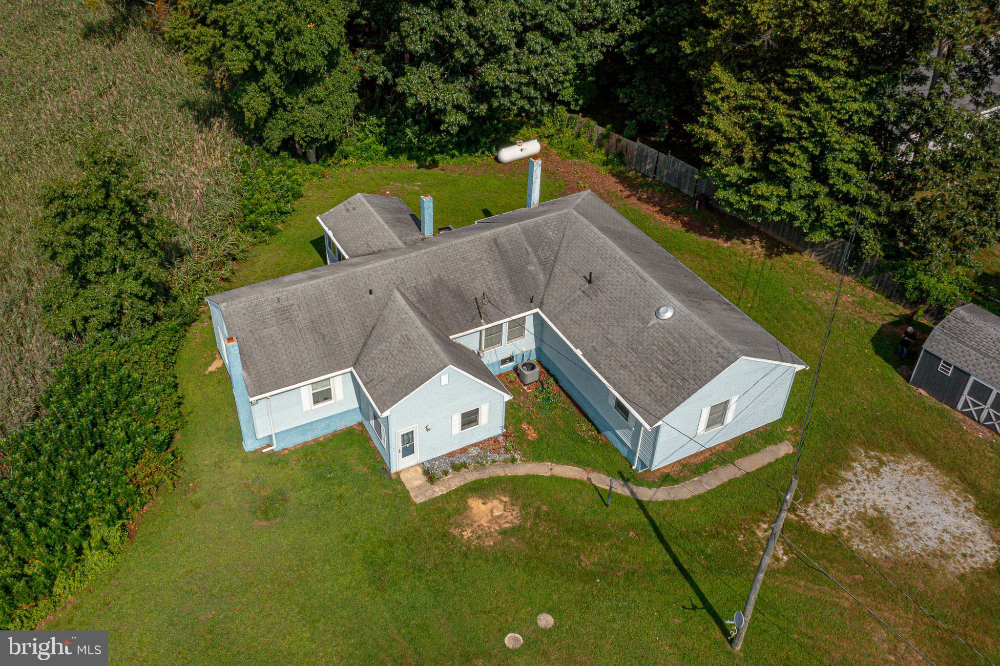 69 Buckhorn Road Salem, NJ 08079 - Photo 3 of 38 an aerial view of a house with garden space and street view