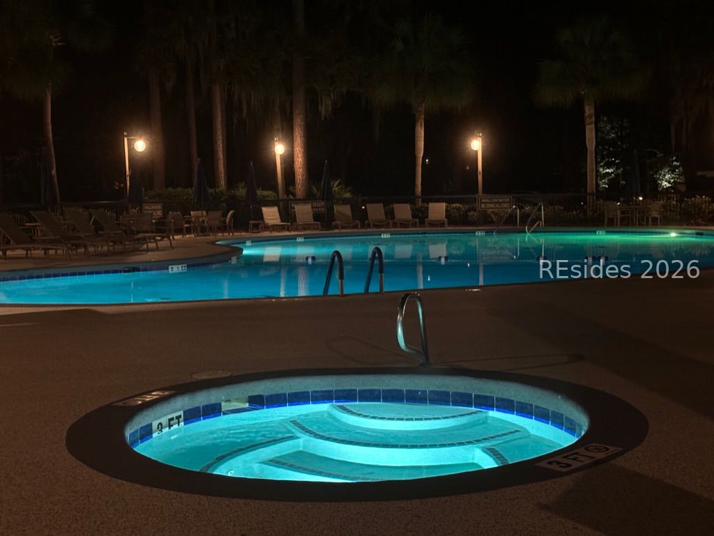 133 Arrow Road, Unit 23 Hilton Head Island, SC 29928 - Photo 8 of 22 Hot tub and swimming pool by clubhouse