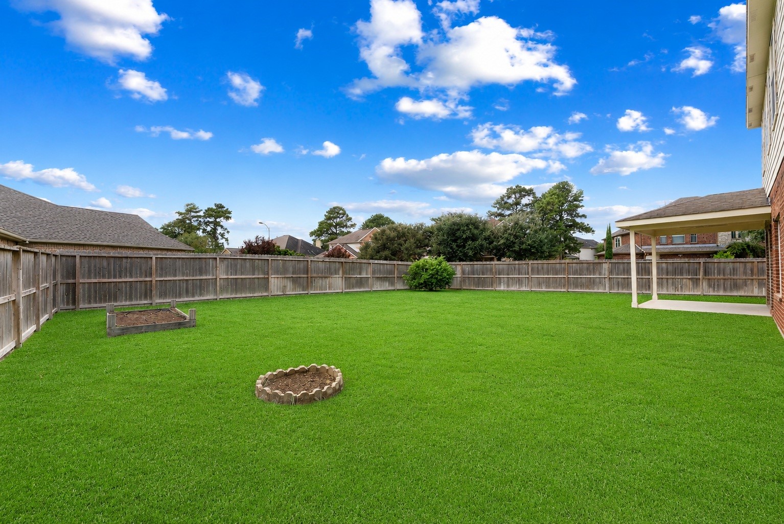 19415 Sorrell Ridge Drive Spring, TX 77388 - Photo 42 of 44 Yard is complete with growing beds for your favorite veggies or flowers.