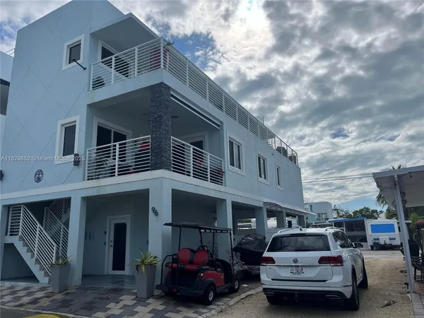 a car parked in front of a house