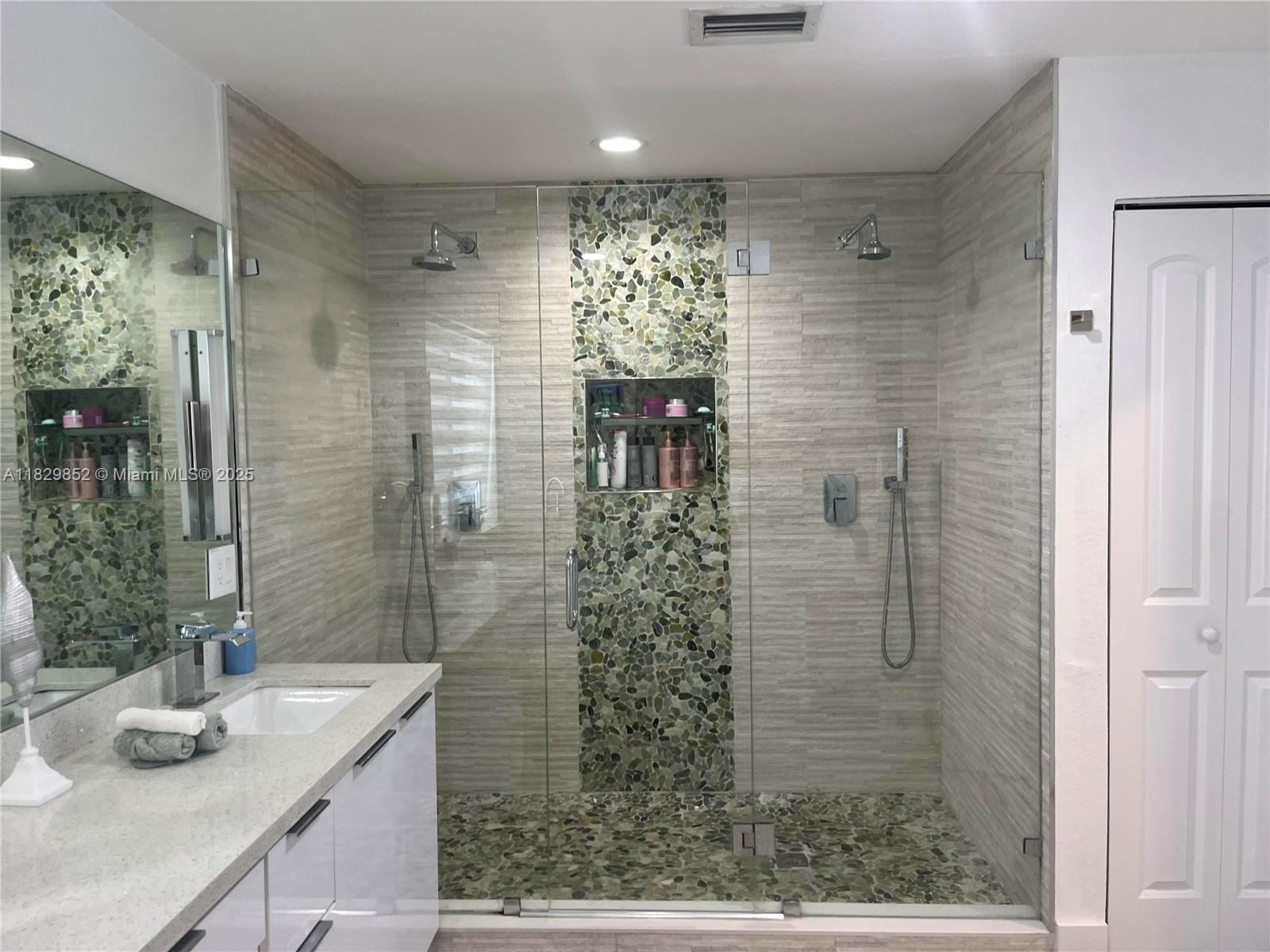 325 Calusa Street Key Largo, FL 33037 - Photo 11 of 17 a bathroom with a shower and a sink