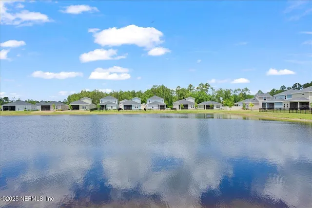 a view of a lake with houses