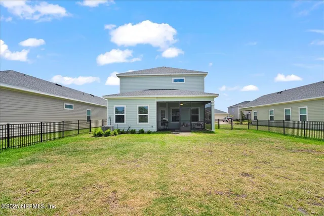 a view of a yard in front of a house