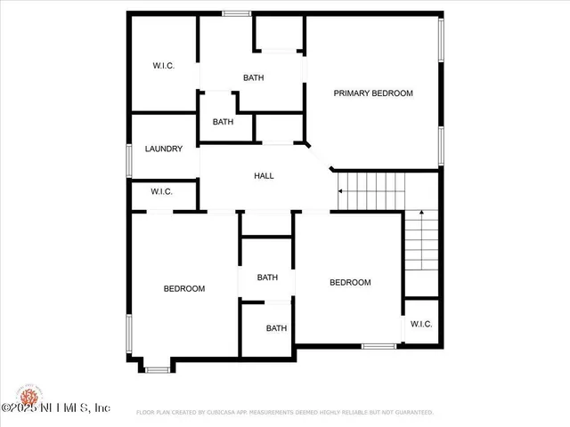 a picture of a bench in front of a wall