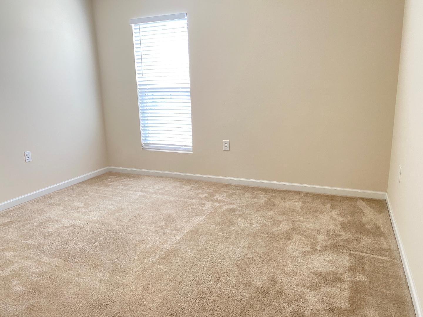 1005 Saffron Loop Durham, NC 27713 - Photo 17 of 26 an empty room with a window