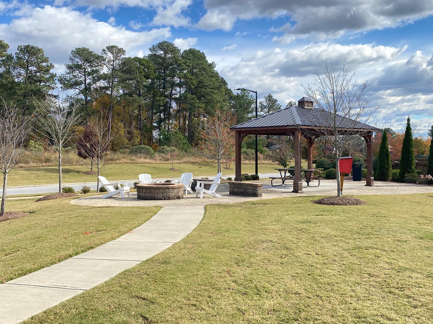 1005 Saffron Loop Durham, NC 27713 - Photo 22 of 26 a view of a swimming pool with an outdoor seating