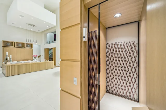 a view of a bathroom with a tub and shower