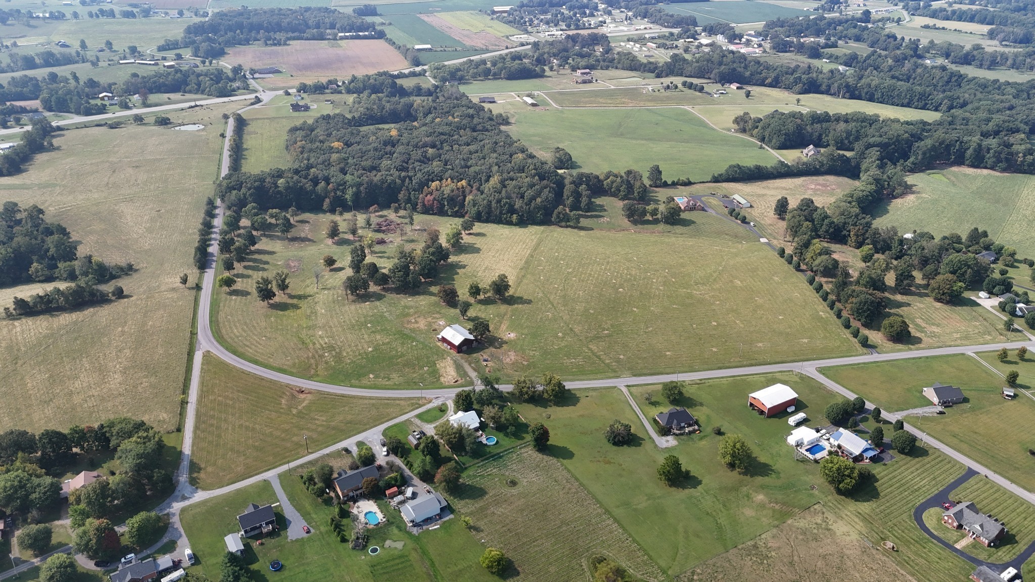 21 Coleytown Road Lafayette, TN 37083 - Photo 2 of 4 an aerial view of a house with a swimming pool