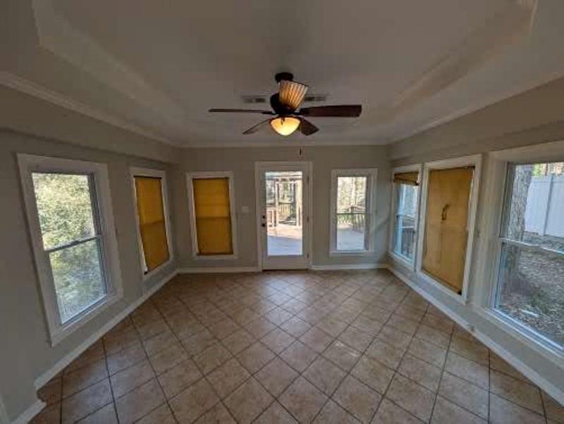 1216 Beech Haven Road Northeast Atlanta, GA 30324 - Photo 6 of 18 a view of an empty room with window and chandelier fan