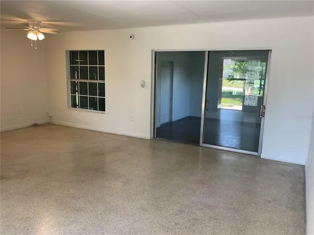 an empty room with windows