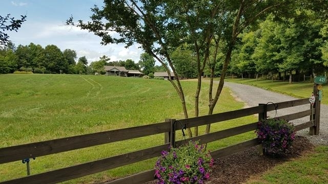 421 Purcell Road Homer, GA 30547 - Photo 1 of 1 a view of a garden with wooden fence