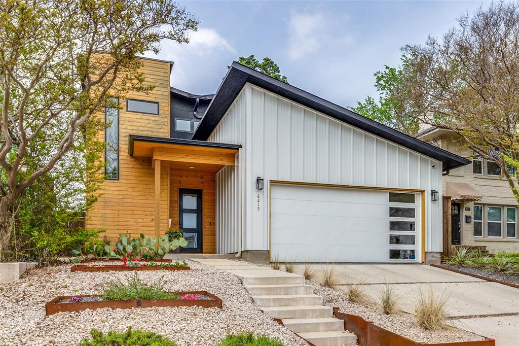 6215 Llano Avenue Dallas, TX 75214 - Photo 1 of 38 a front view of a house with a yard