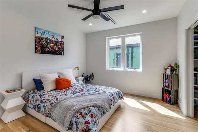 a bedroom with bed and a window