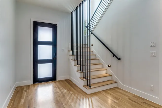 a view of a hallway with staircase