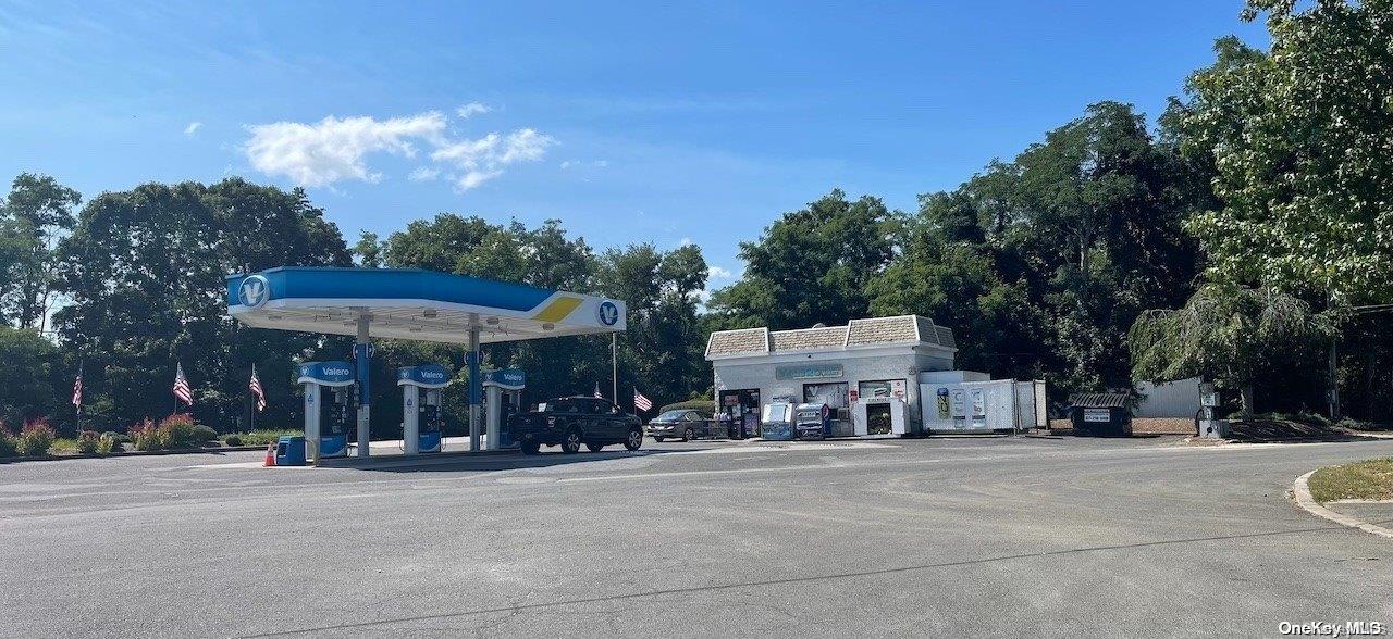 Rt-25a Wading River, NY 11792 - Photo 11 of 13 a car parked in front of a building