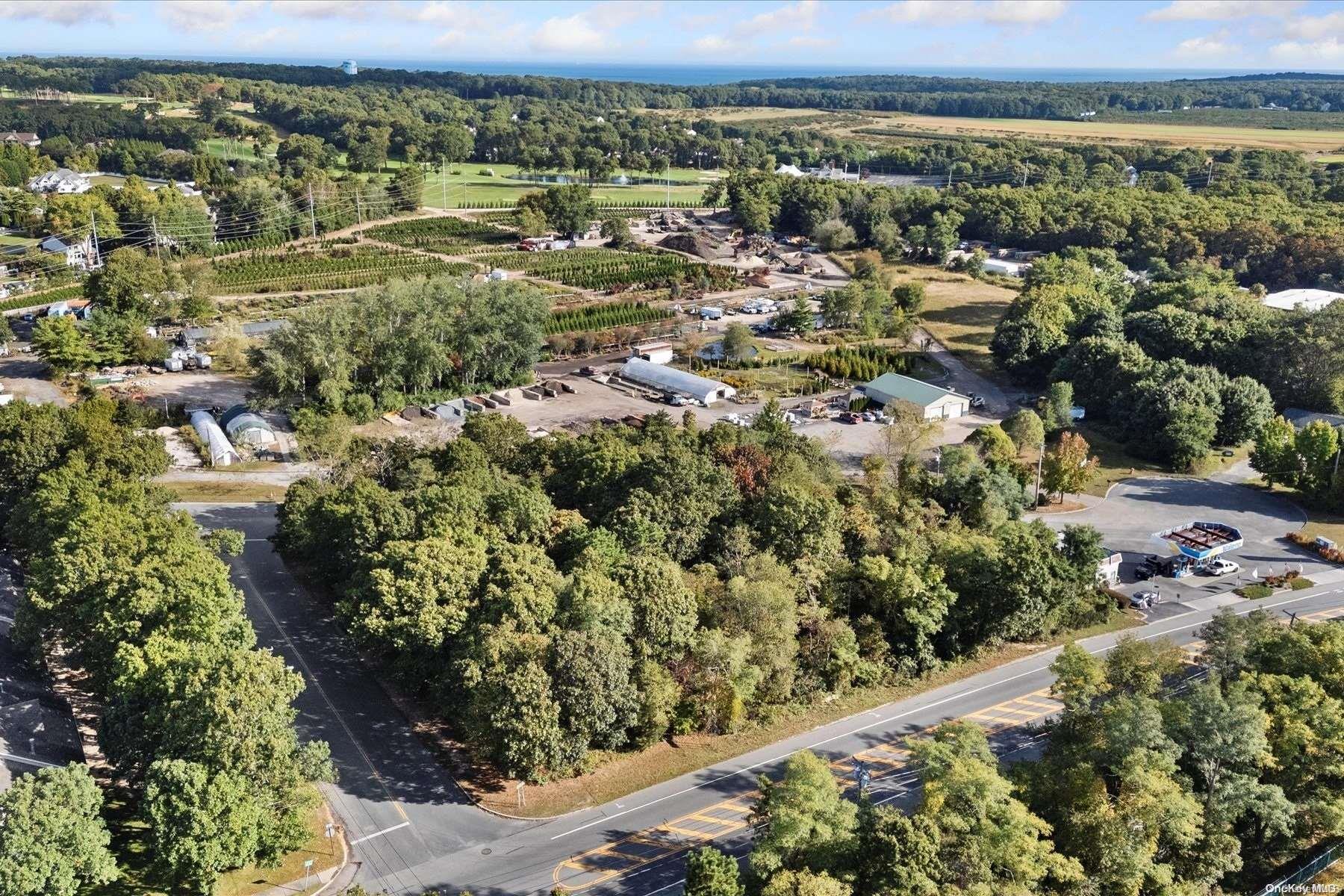 Rt-25a Wading River, NY 11792 - Photo 7 of 13 an aerial view of a houses with a yard