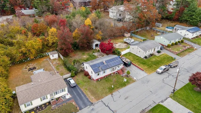 an aerial view of a house with a garden