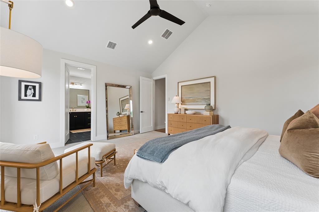 3922 Redding Row Dallas, TX 75220 - Photo 22 of 35 a bedroom with a bed mirror and a window