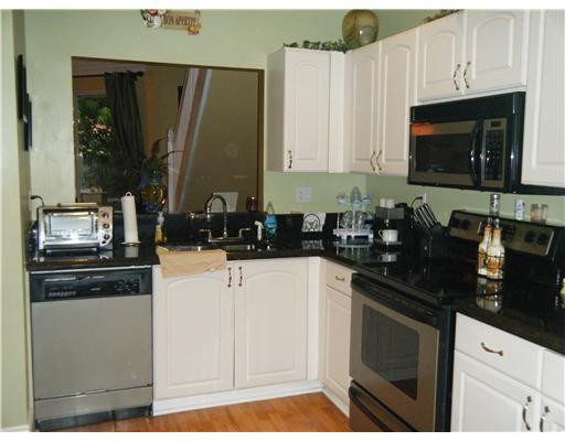4090 Tree Top Road Cooper City, FL 33026 - Photo 3 of 13 Kitchen