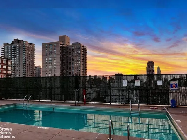 a view of a city with tall buildings