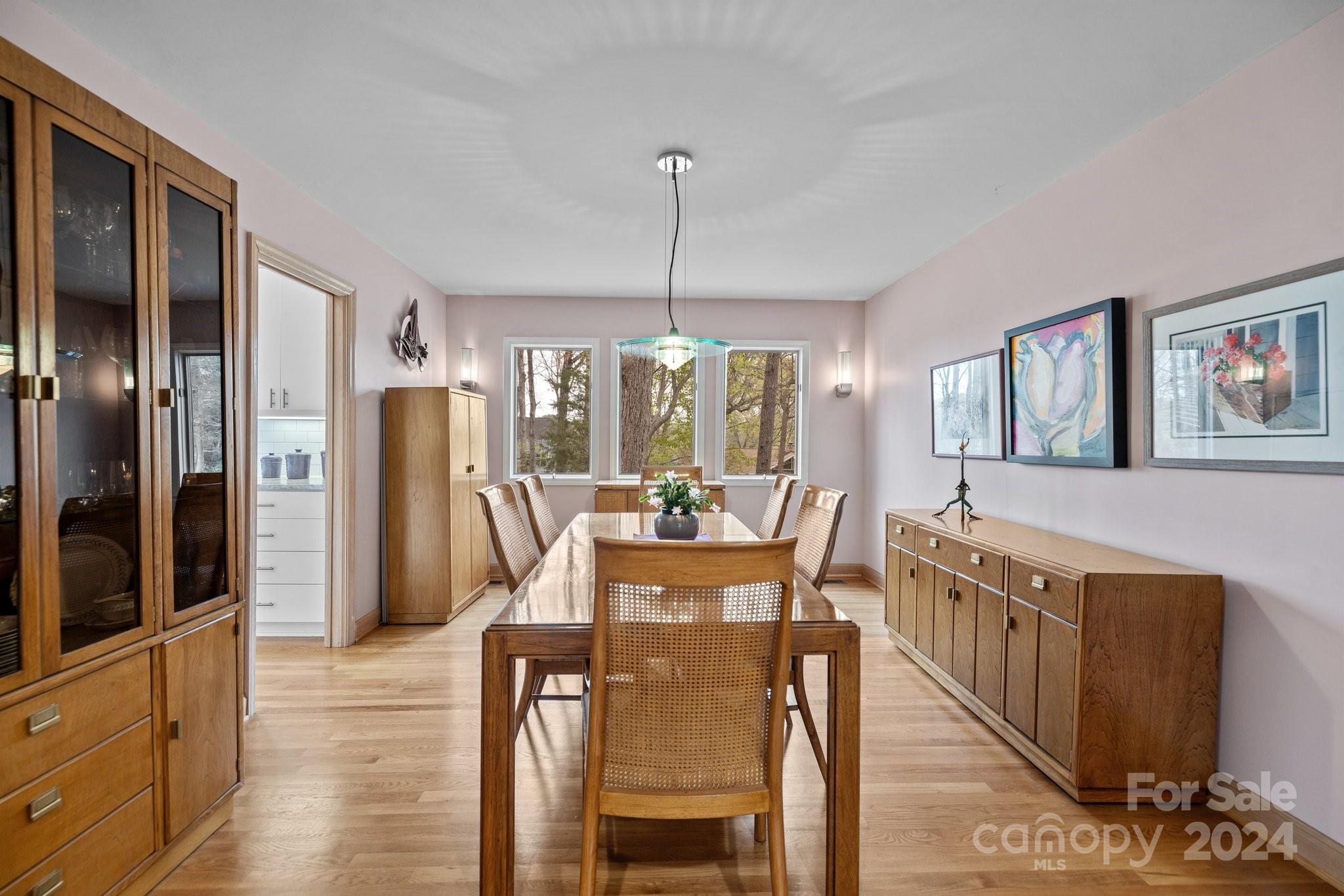 4500 Rounding Run Road Charlotte, NC 28277 - Photo 17 of 41 a view of a dining room with furniture window and wooden floor