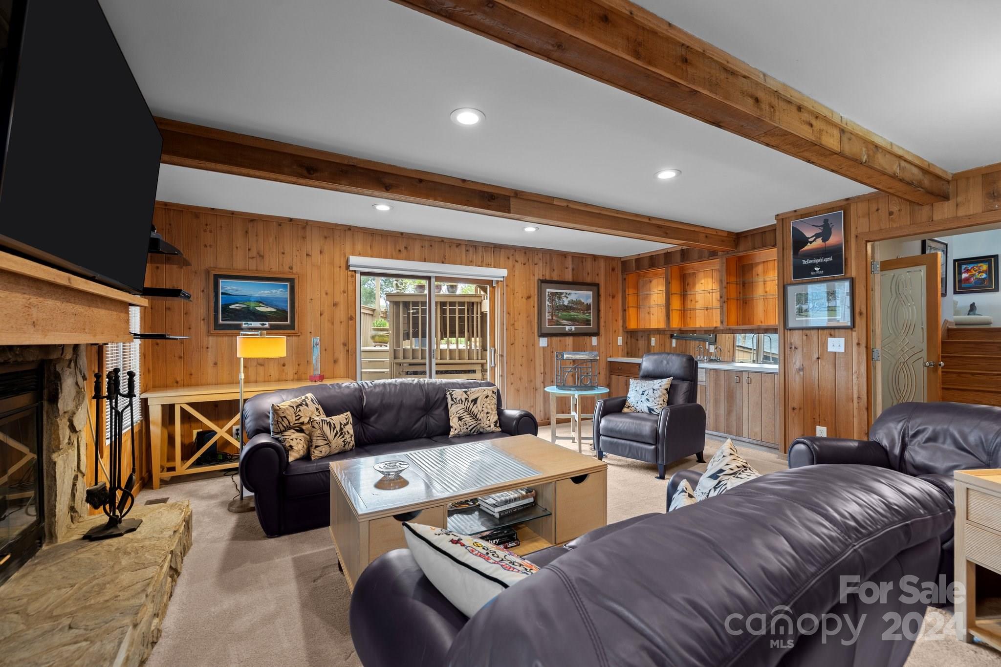 4500 Rounding Run Road Charlotte, NC 28277 - Photo 28 of 41 a living room with furniture and a flat screen tv