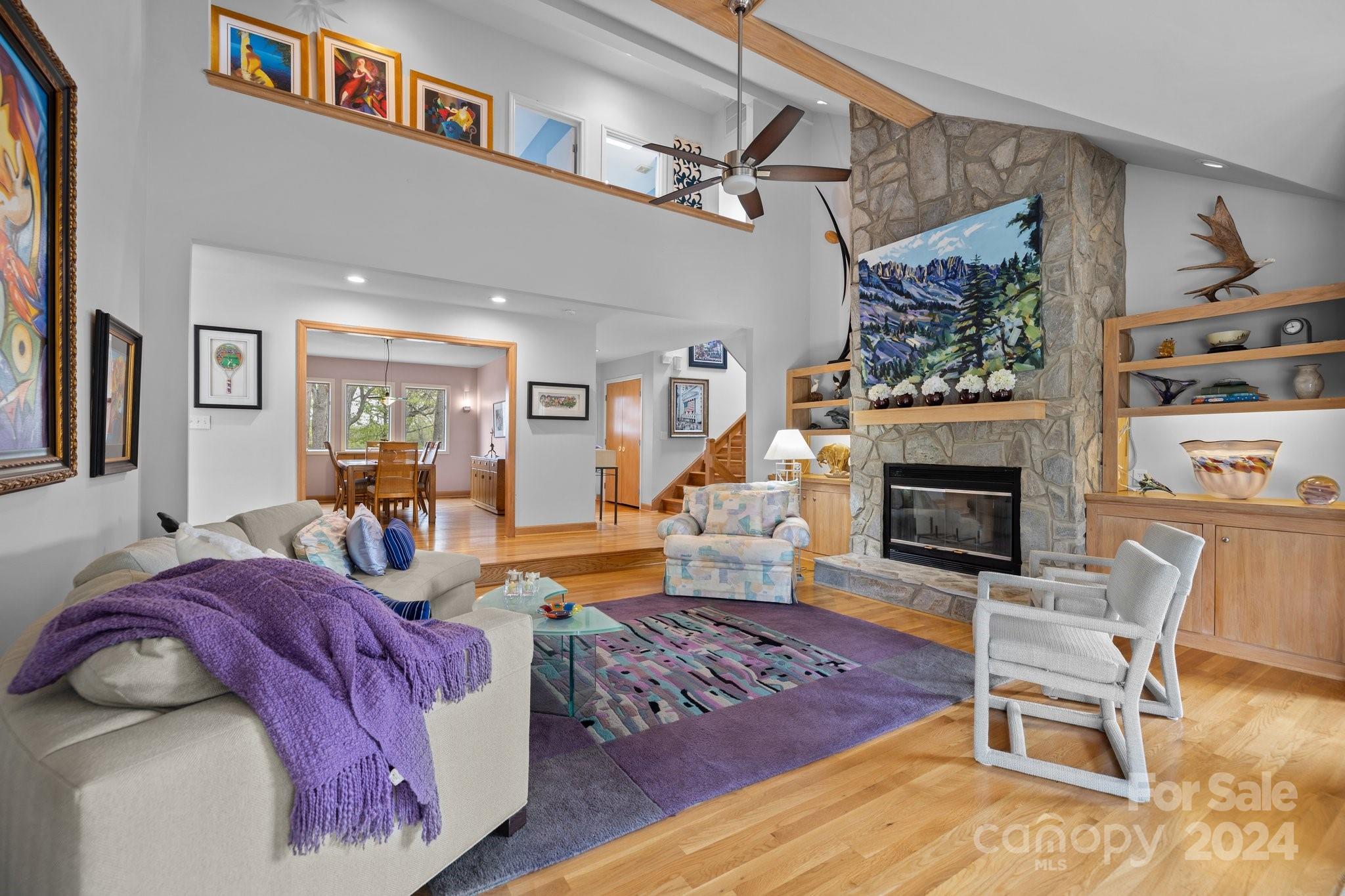 4500 Rounding Run Road Charlotte, NC 28277 - Photo 3 of 41 a living room with furniture and a fireplace
