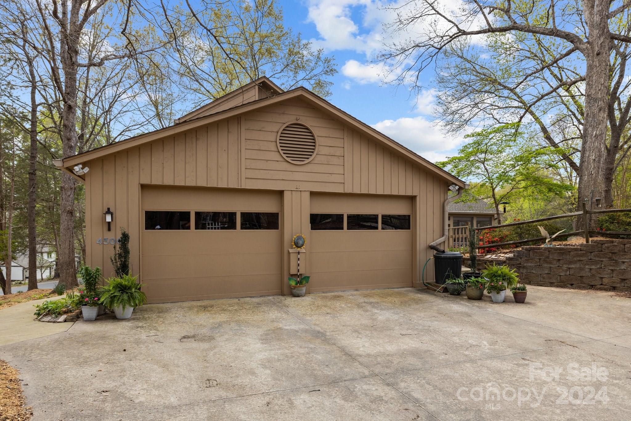 4500 Rounding Run Road Charlotte, NC 28277 - Photo 38 of 41 a view of a house with a yard