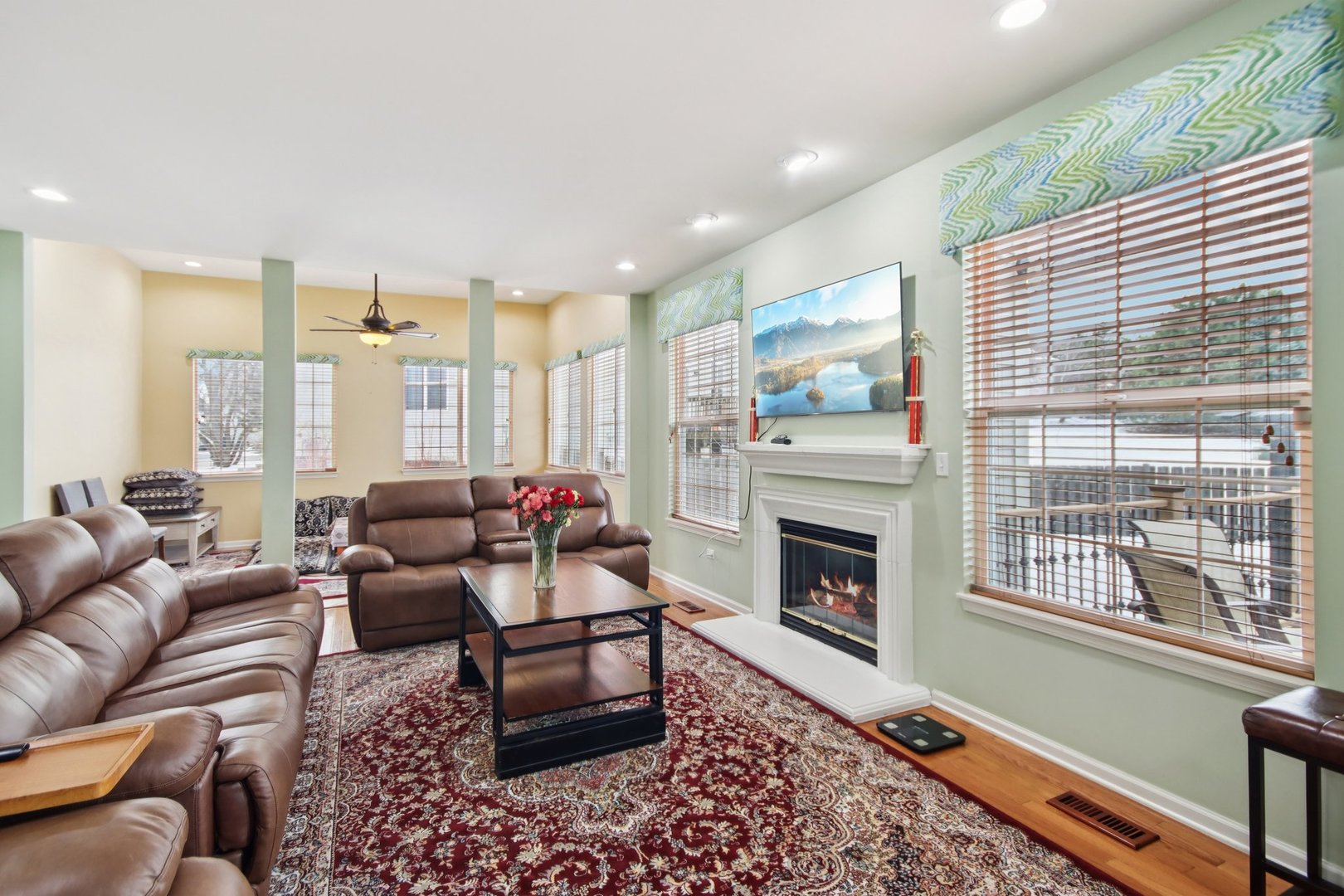 2930 Kelly Drive Elgin, IL 60124 - Photo 16 of 45 a living room with furniture fireplace and window