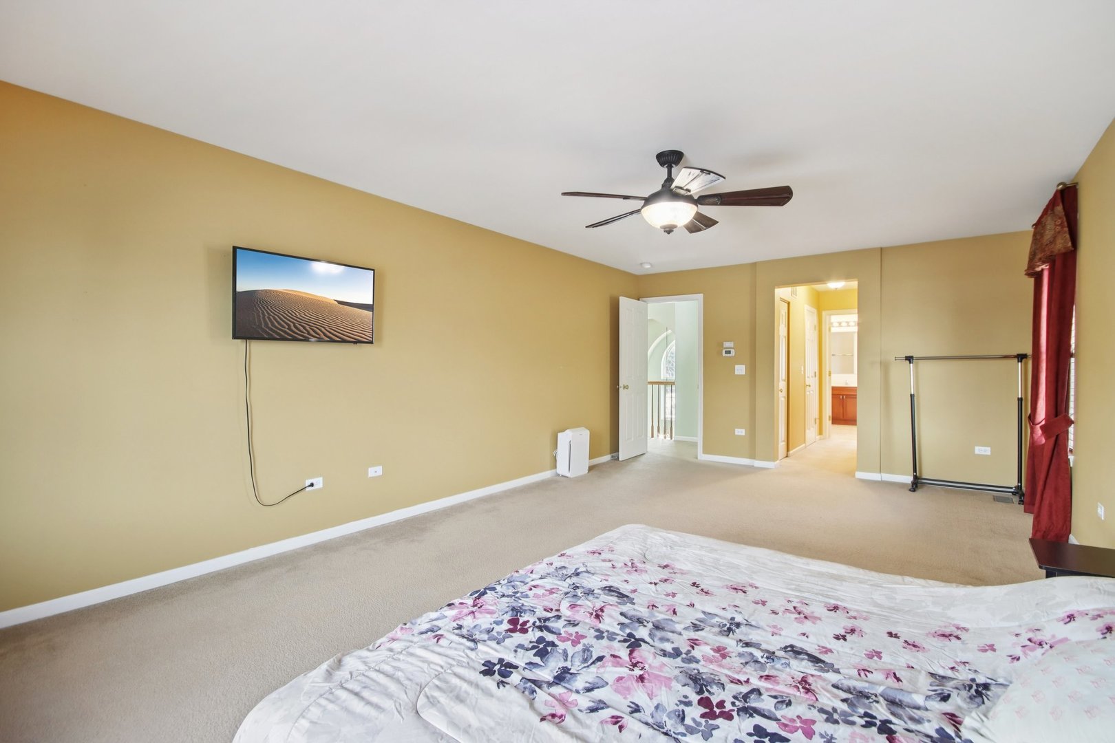 2930 Kelly Drive Elgin, IL 60124 - Photo 26 of 45 a bedroom with a bed and a chandelier