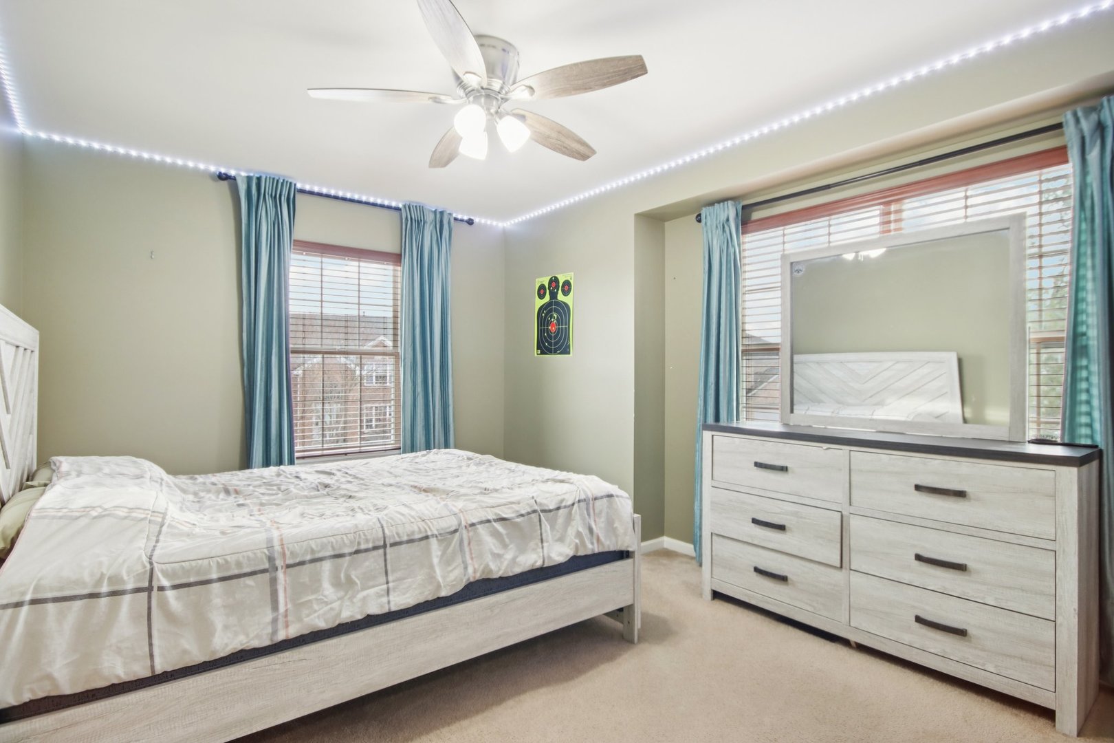 2930 Kelly Drive Elgin, IL 60124 - Photo 31 of 45 a bedroom with a large bed and a dresser