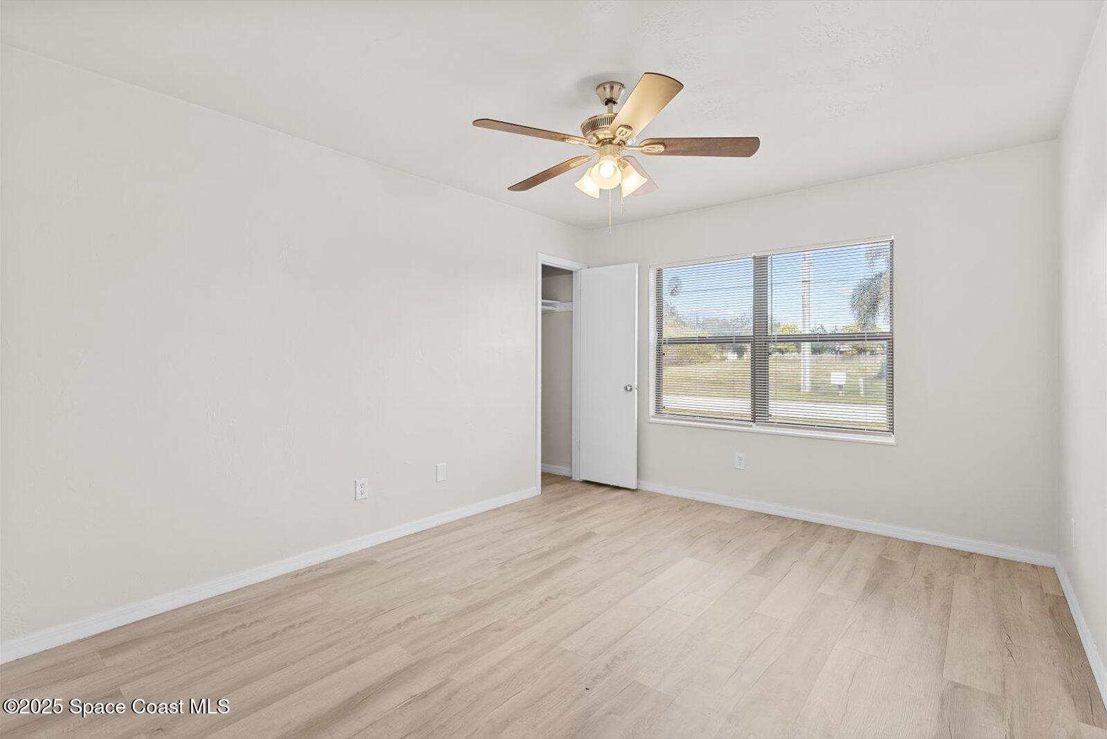 402 Southwest Sansom Lane Port St. Lucie, FL 34953 - Photo 20 of 33 a view of an empty room with a window
