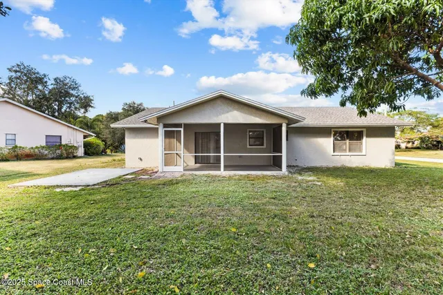 a house view with a garden space