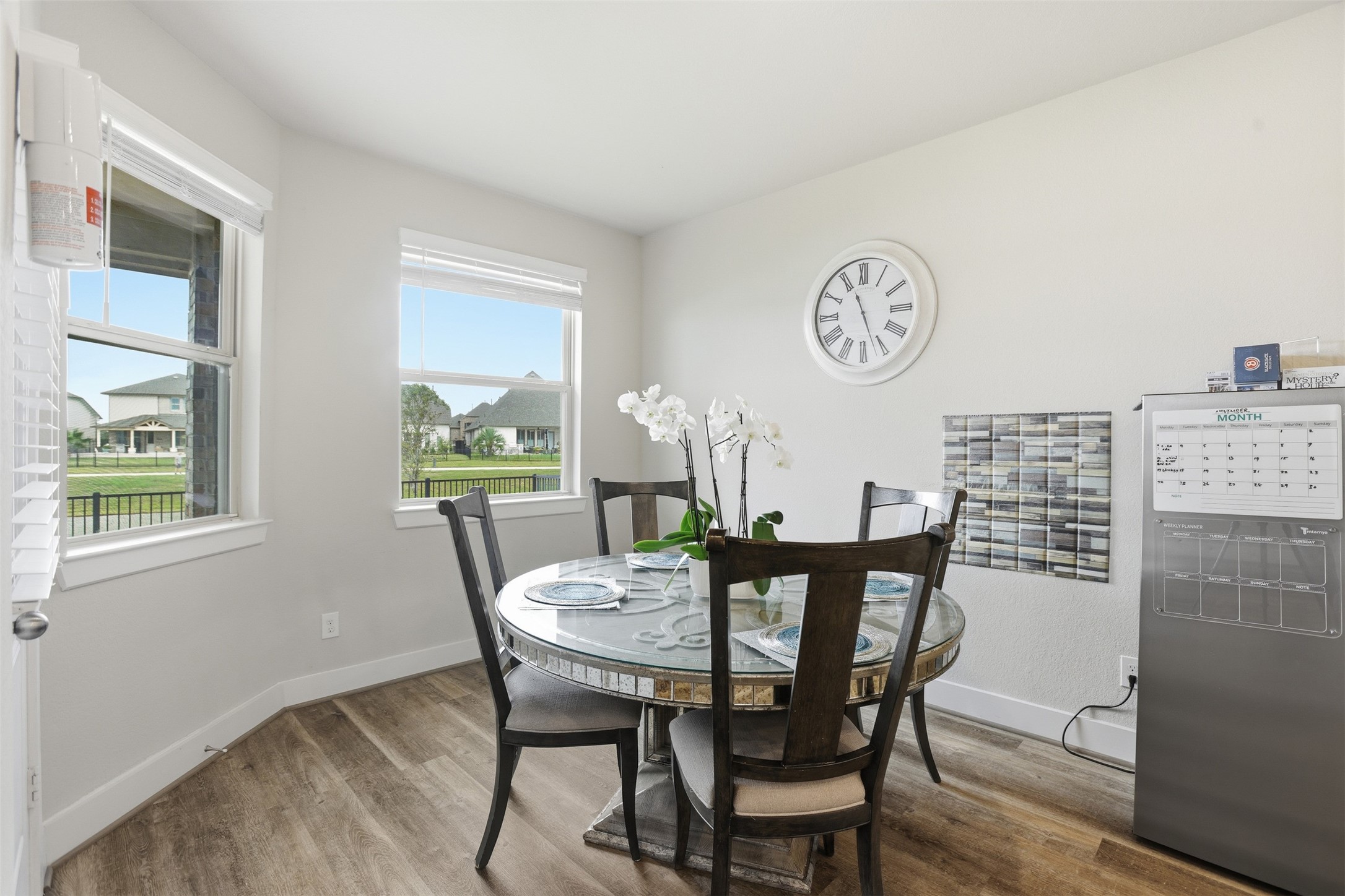 2725 Arbor Edge Crossing La Marque, TX 77568 - Photo 14 of 38 a dining room with furniture a rug and a window