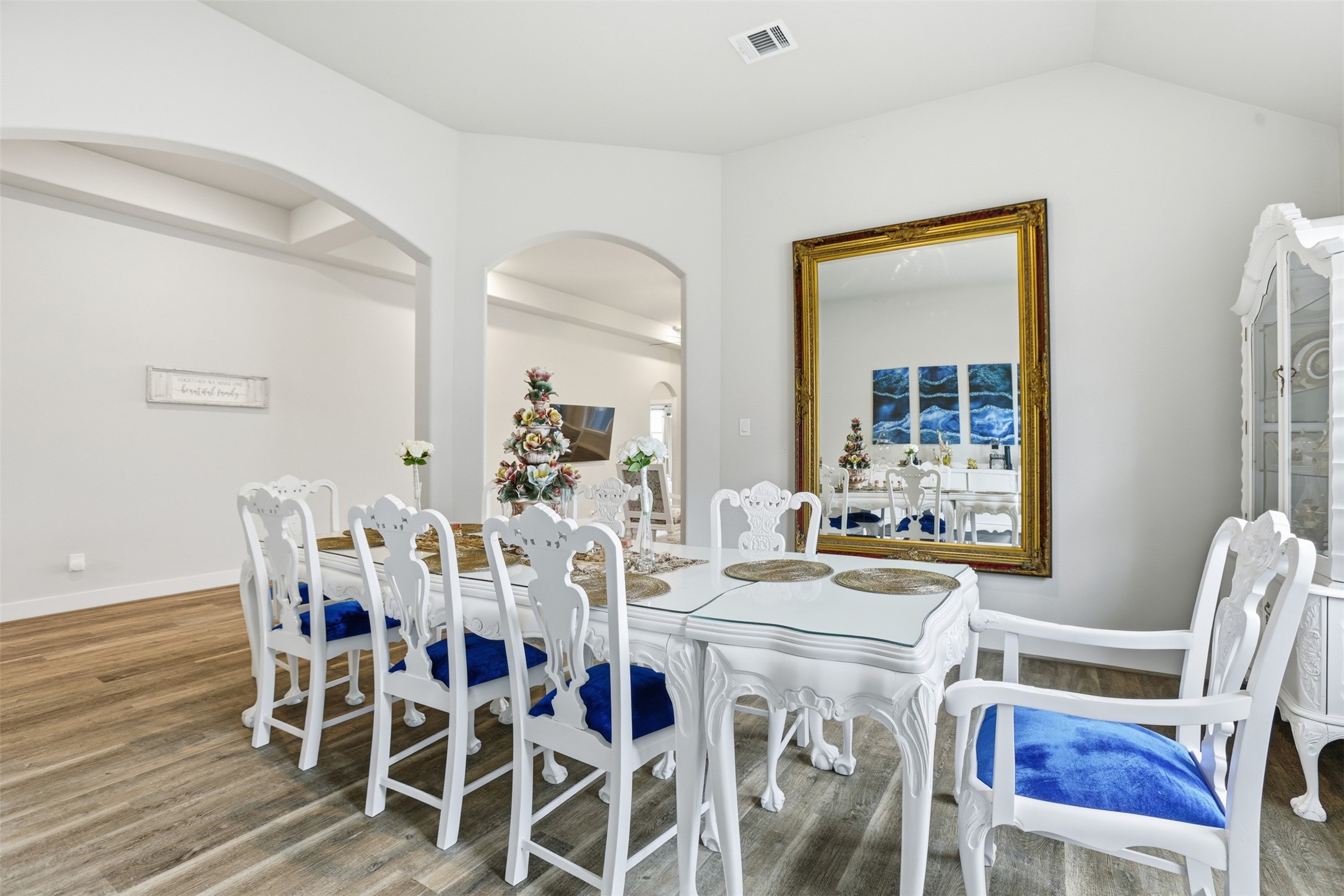 2725 Arbor Edge Crossing La Marque, TX 77568 - Photo 17 of 38 a view of a dining room with furniture and wooden floor