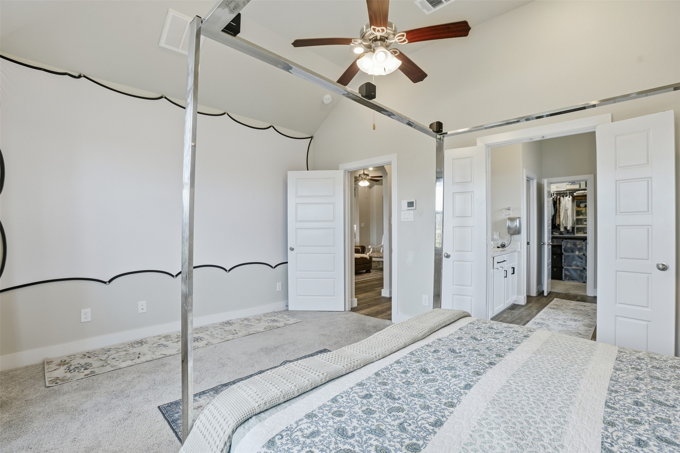 2725 Arbor Edge Crossing La Marque, TX 77568 - Photo 21 of 38 a bedroom with a bed ceiling fan and a wooden floor