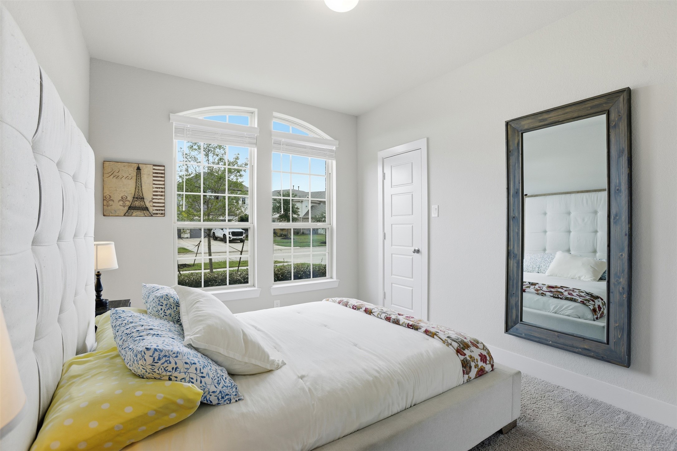 2725 Arbor Edge Crossing La Marque, TX 77568 - Photo 28 of 38 a bedroom with a bed and glass window