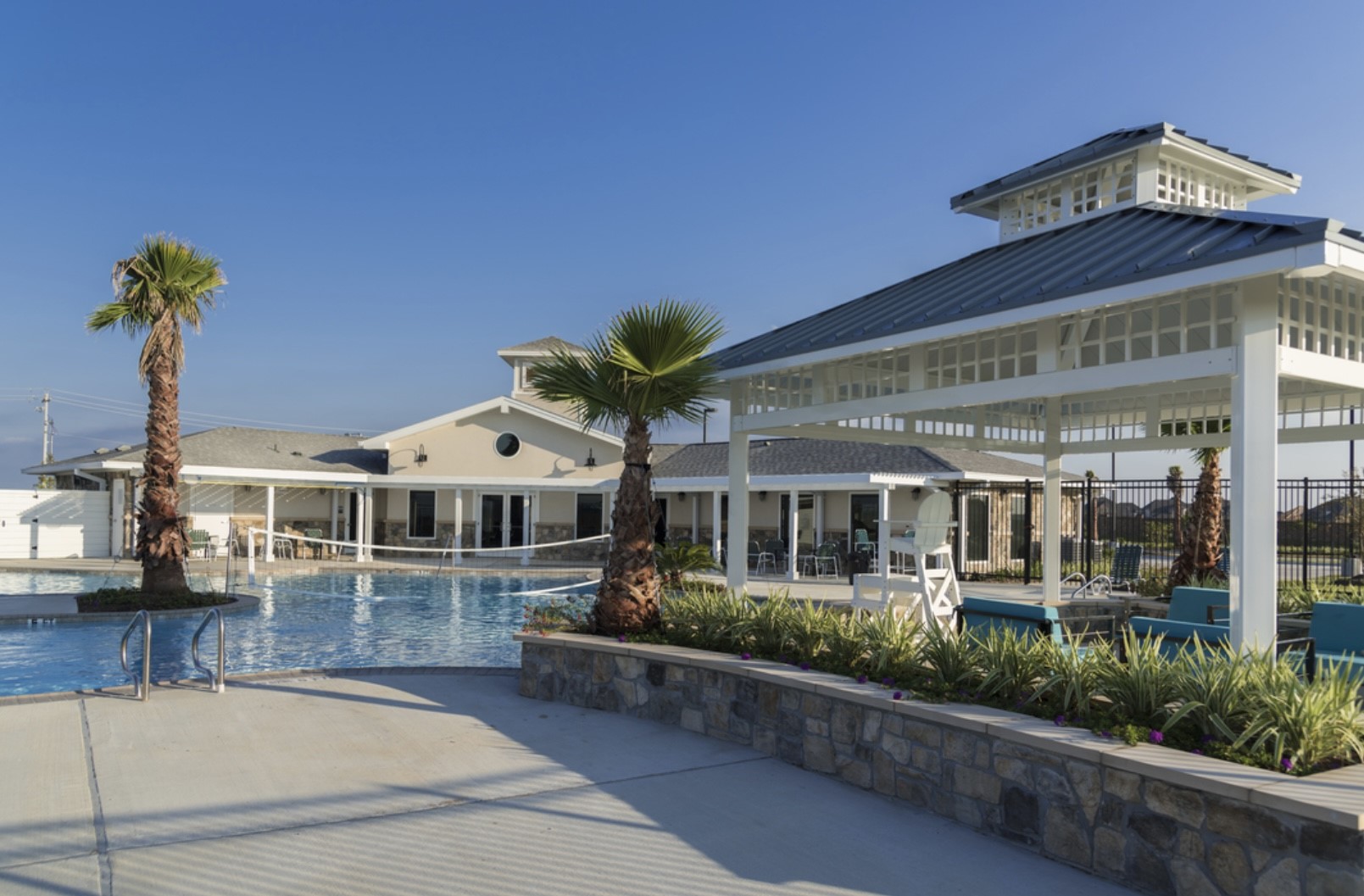 2725 Arbor Edge Crossing La Marque, TX 77568 - Photo 38 of 38 a front view of a house with a yard and potted plants