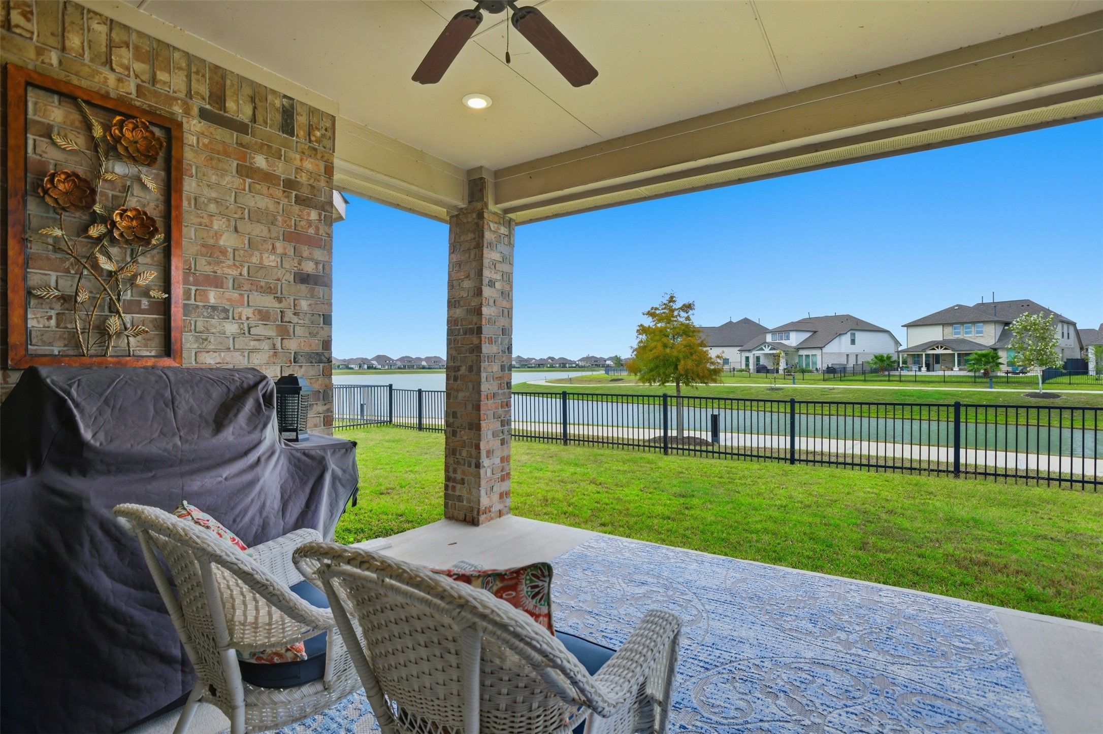 2725 Arbor Edge Crossing La Marque, TX 77568 - Photo 4 of 38 a view of a porch with furniture and garden