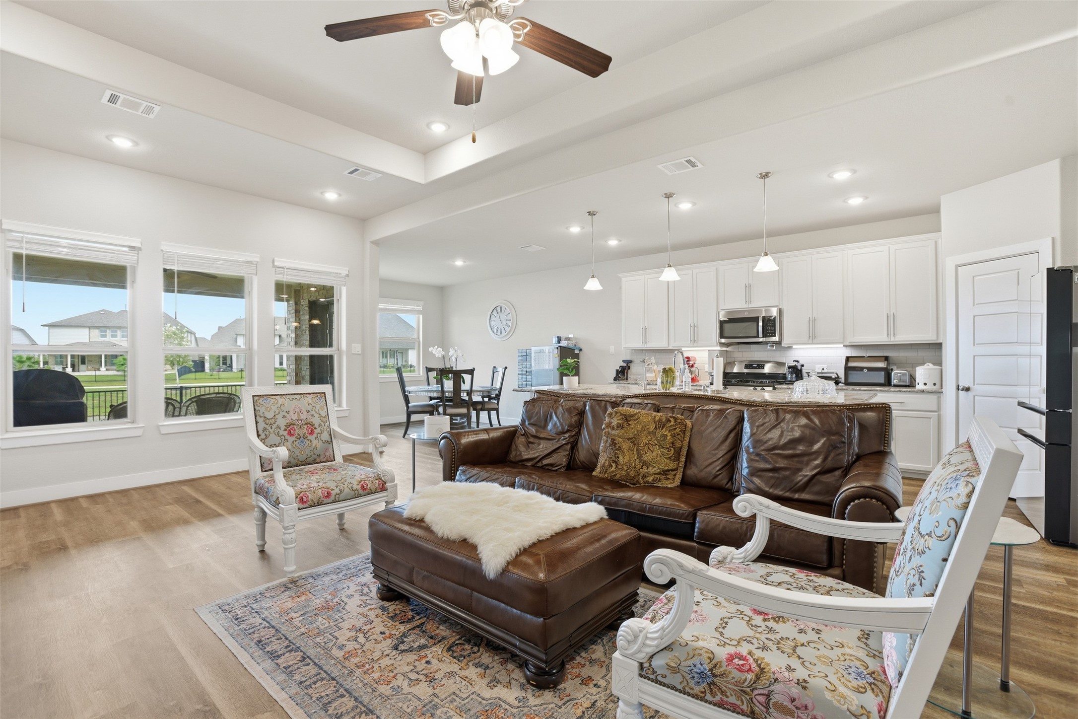 2725 Arbor Edge Crossing La Marque, TX 77568 - Photo 9 of 38 a living room with furniture and kitchen view