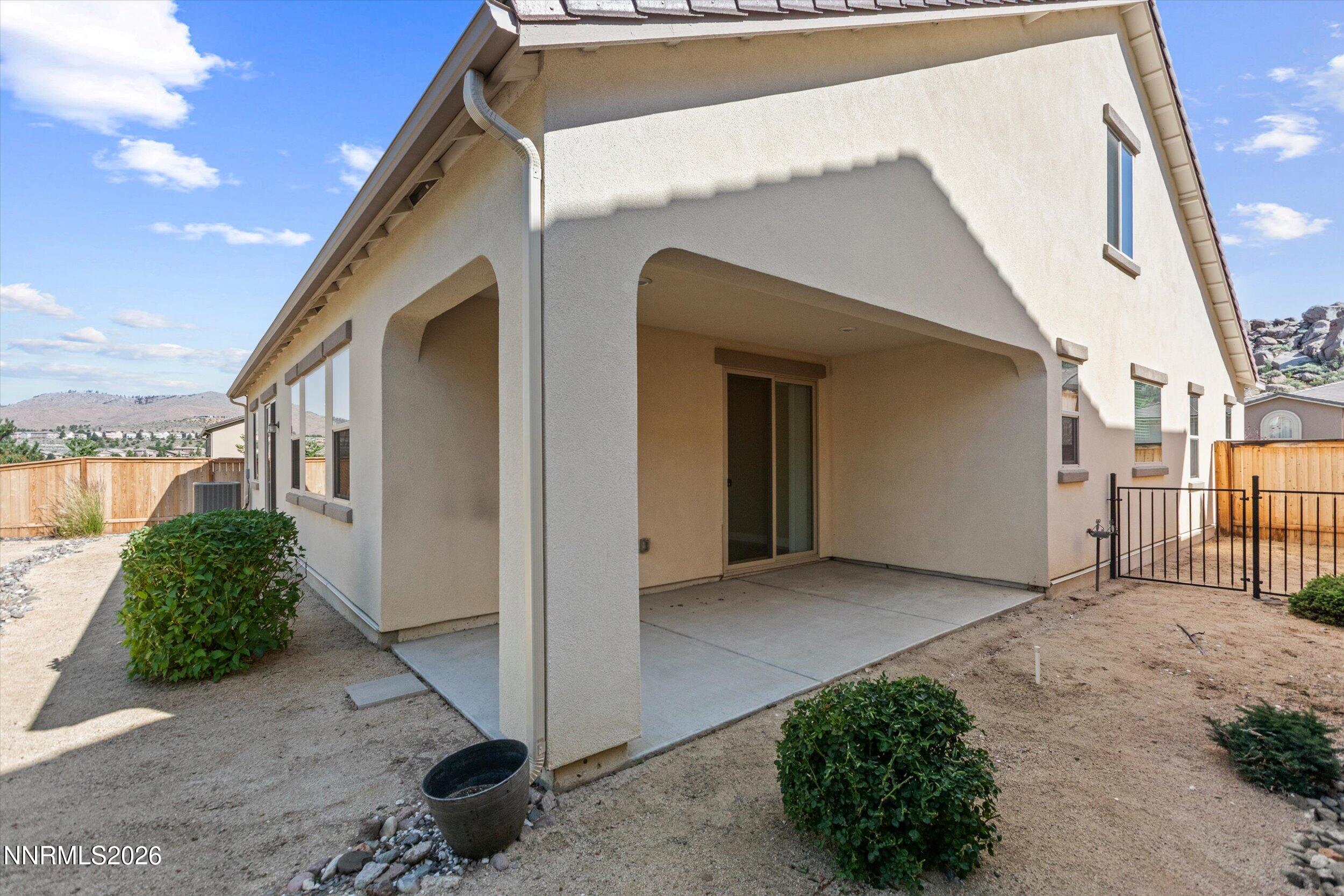1725 Verdi Vista Court Reno, NV 89523 - Photo 31 of 37 a view of a house with backyard and plants