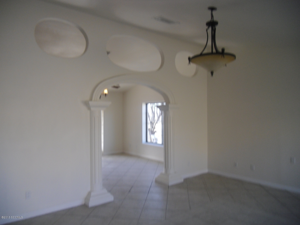 264 Paseo Mascota Rio Rico, AZ 85648 - Photo 15 of 39 a view of a hallway with windows