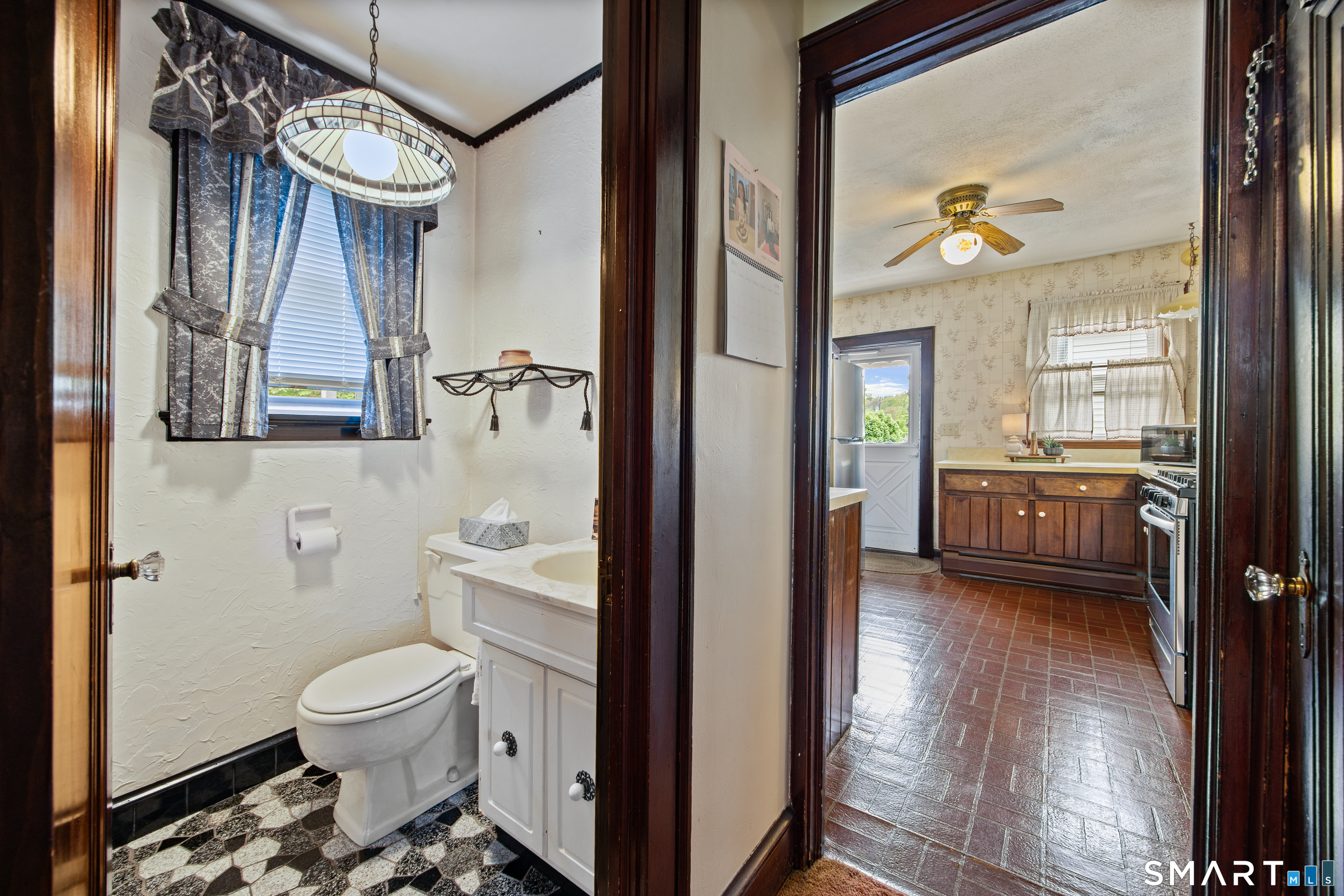 90 Harvard Avenue Meriden, CT 06451 - Photo 13 of 39 a bathroom with a toilet a sink and shower