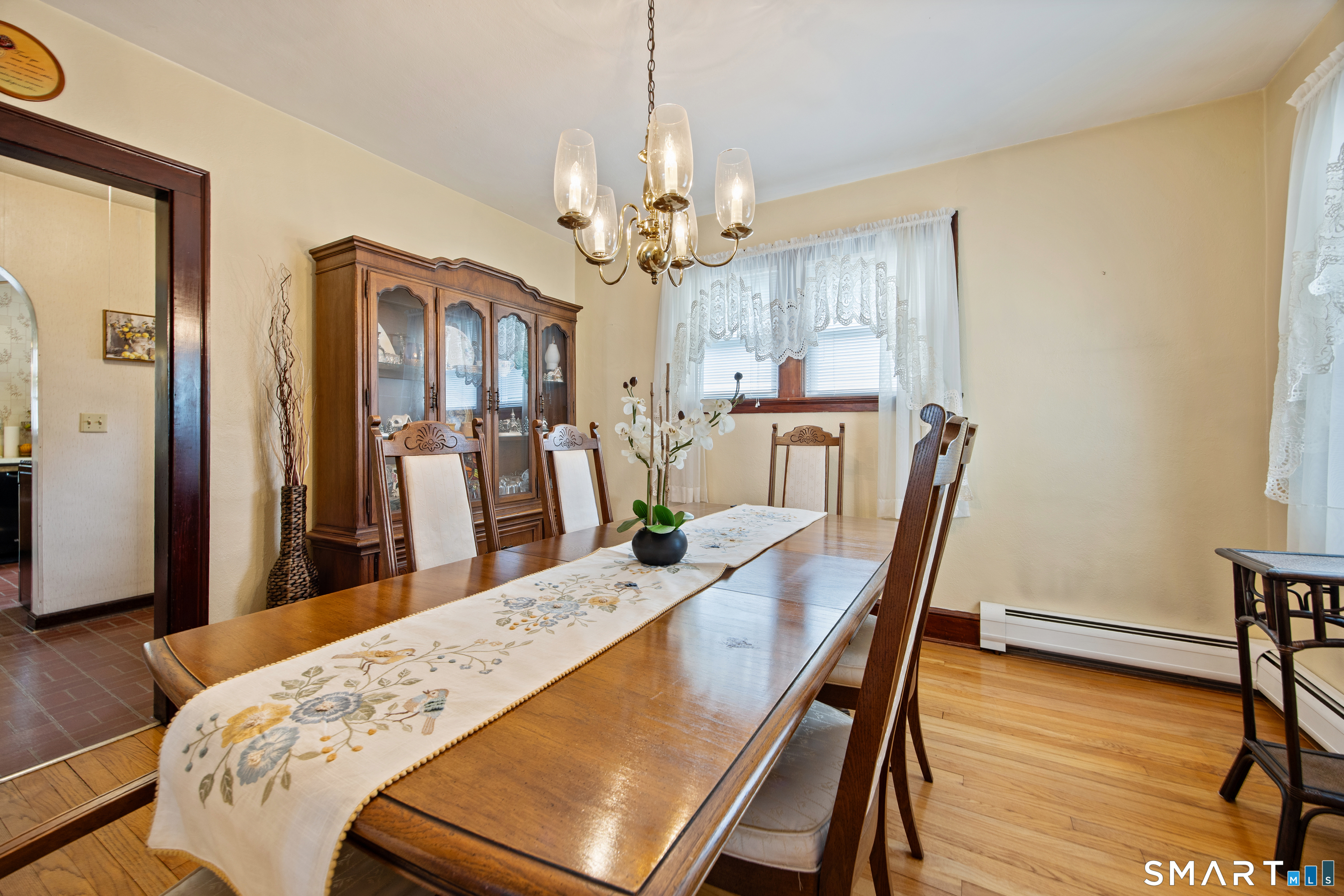 90 Harvard Avenue Meriden, CT 06451 - Photo 20 of 39 a view of a dining room with furniture and wooden floor