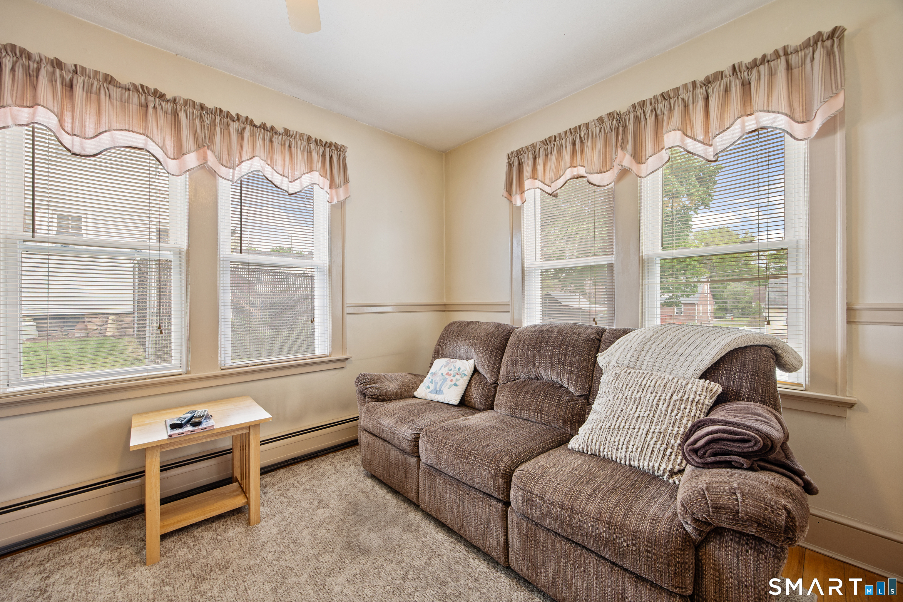 90 Harvard Avenue Meriden, CT 06451 - Photo 25 of 39 a living room with furniture and a large window