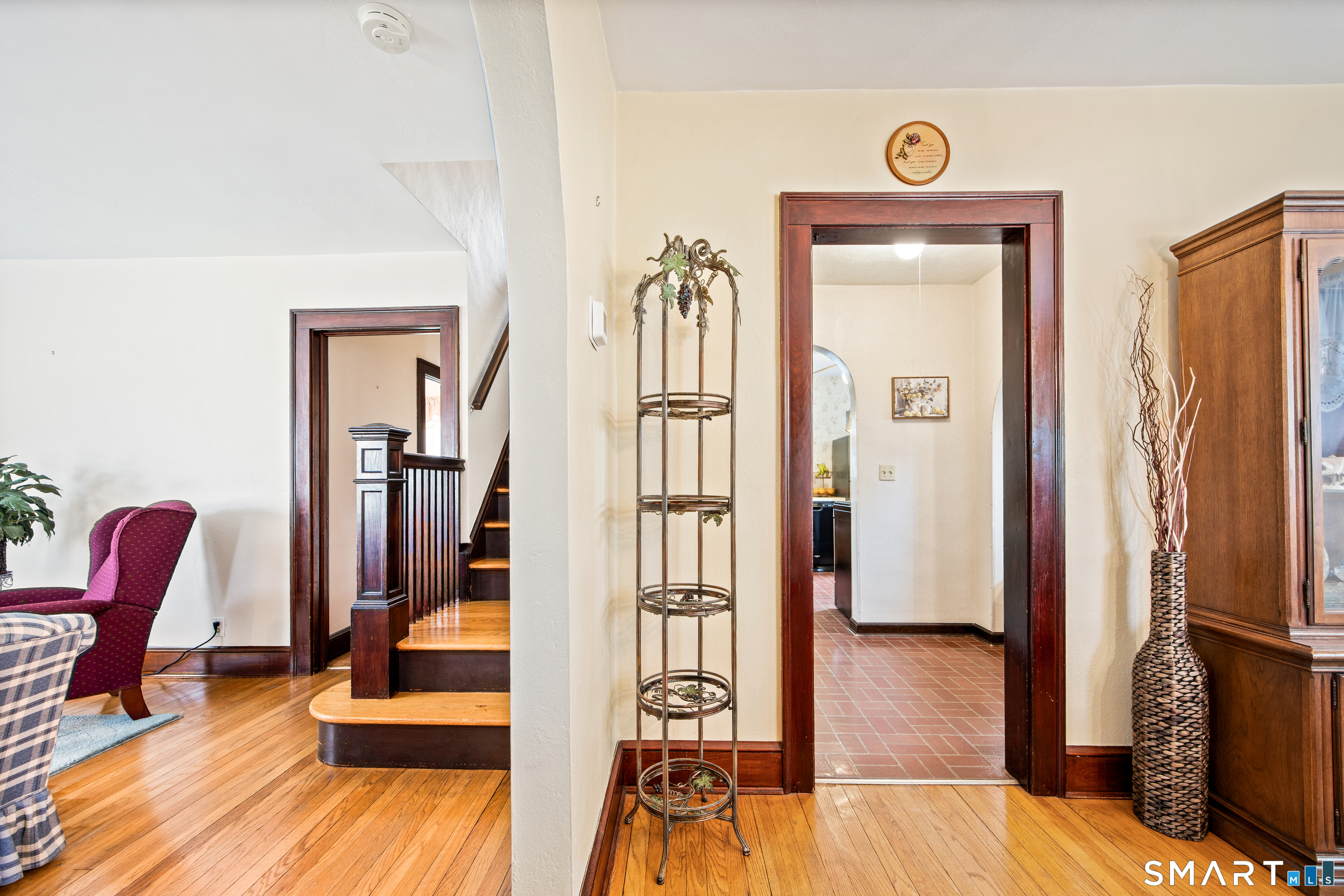 90 Harvard Avenue Meriden, CT 06451 - Photo 26 of 39 a view of a hallway with wooden floor and furniture