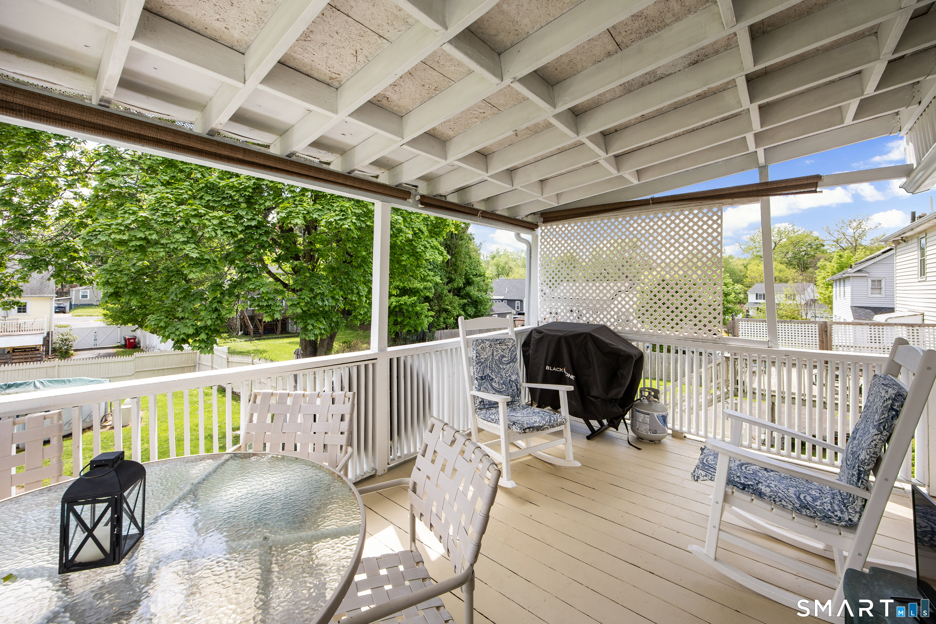 90 Harvard Avenue Meriden, CT 06451 - Photo 3 of 39 a view of a roof deck with furniture